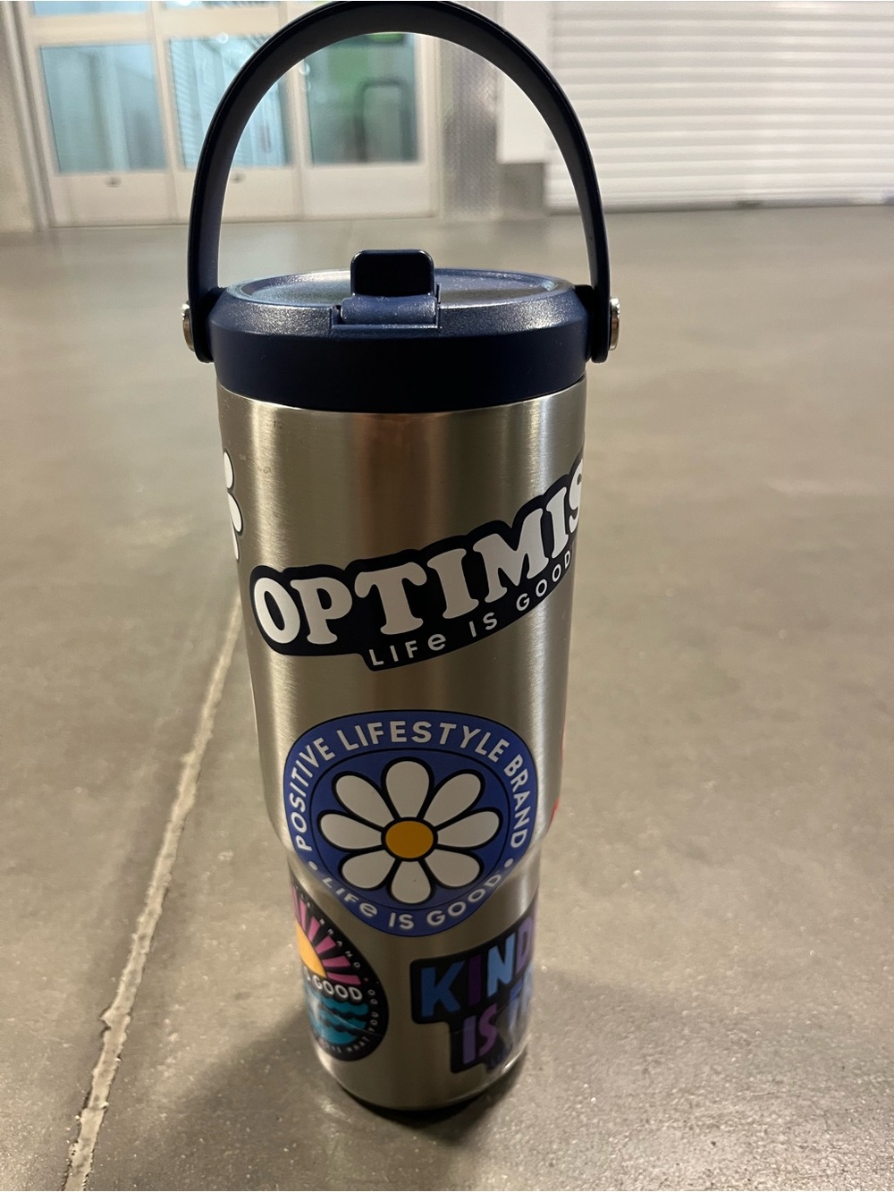 Life Is Good Stainless Steel Water Bottle with Navy Lid and Colorful Stickers